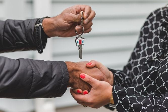 Handing over keys to new home