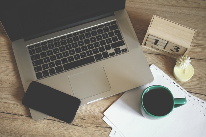 Laptop with coffee setting
