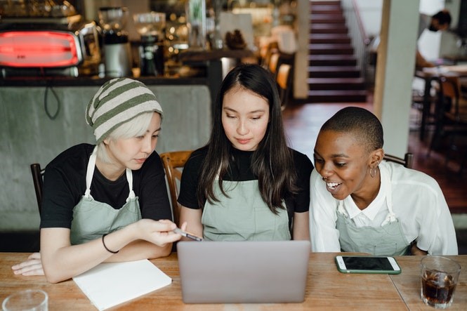 business women watching video