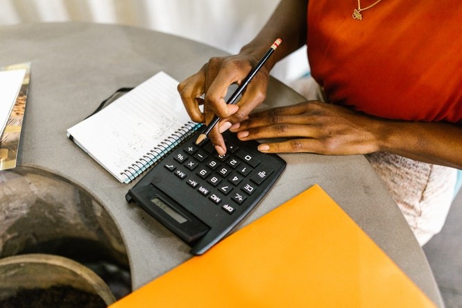 woman using a calculator