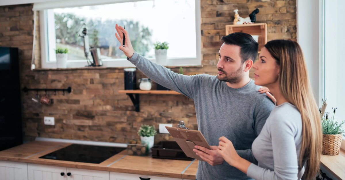 man and woman doing home renovations