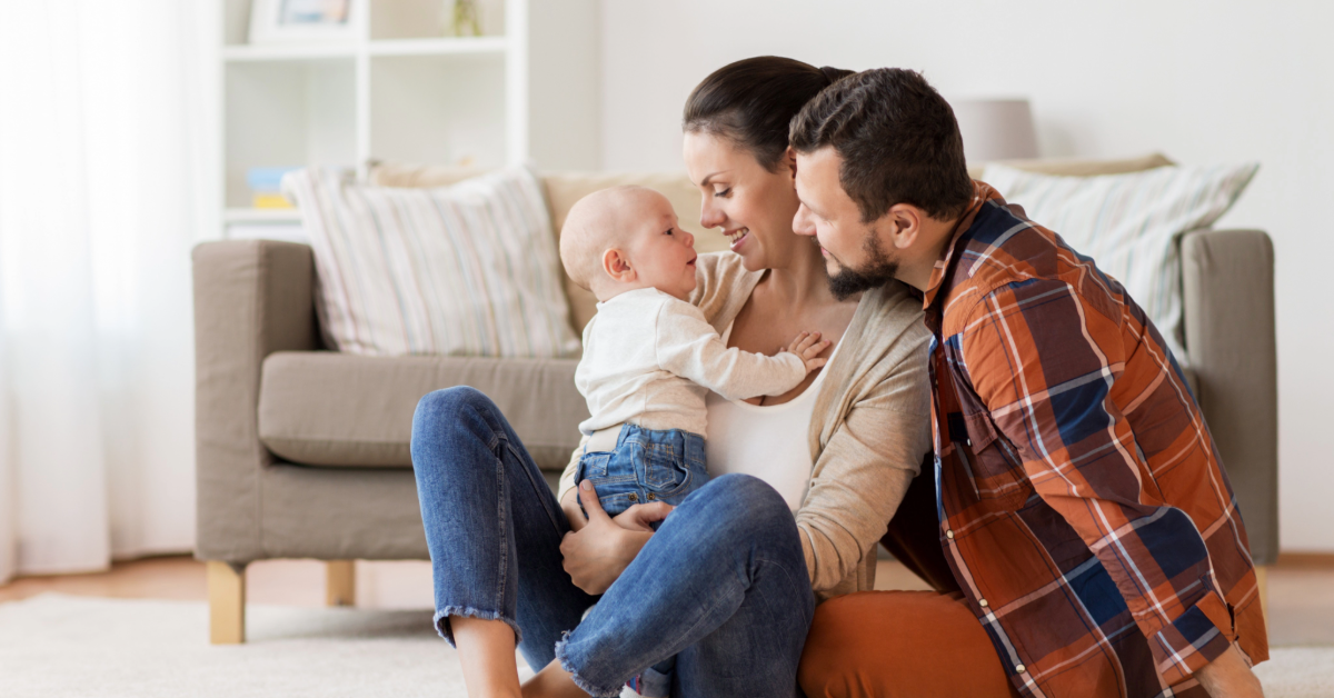 Couple holding baby